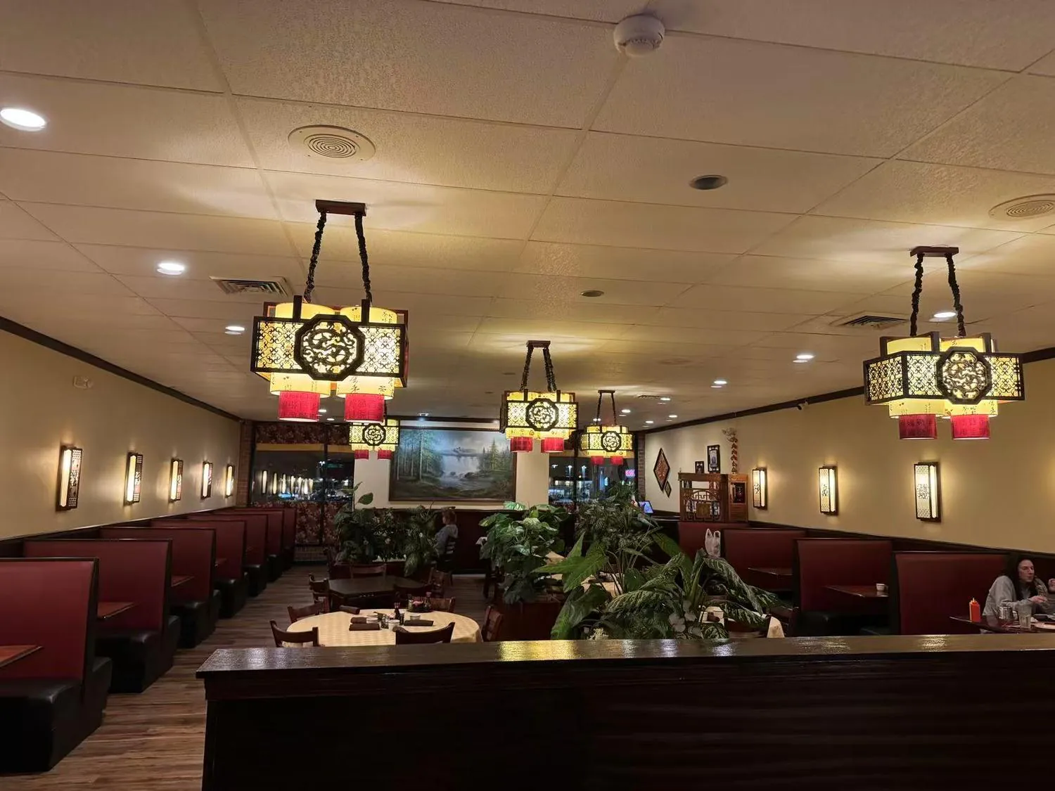 Spacious main dining area with booth seating and decorative lanterns at Forbidden City Chinese Restaurant in Westminster